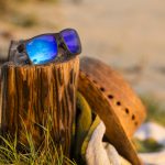 sunglasses left on the beach side