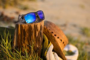 sunglasses left on the beach side