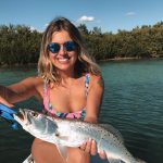 Girl Fishing in Nautilus Sunglasses