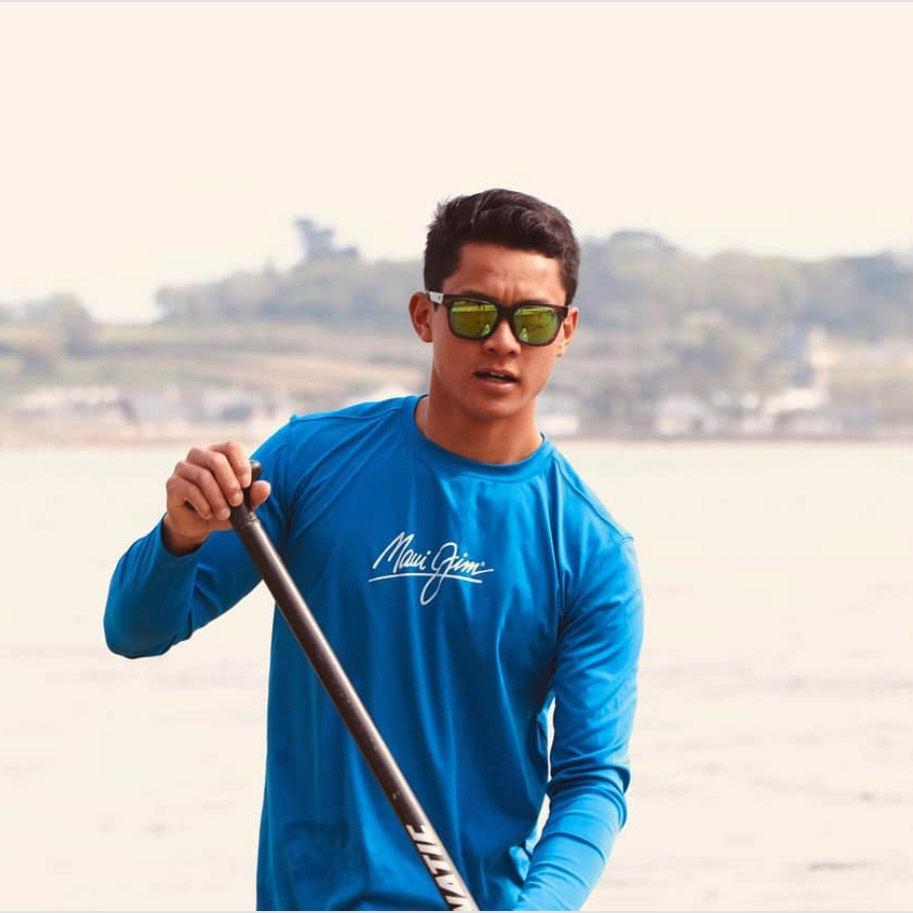 Man Paddle Boarding wearing MAUIGreen Mongoose Sunglasses