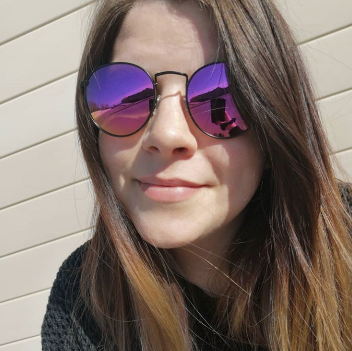 Woman wearing Nautilus sunglasses