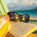 Cat Eye reader sunglasses on book