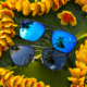Sunglasses with colorful orange lei