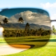 Image of golf course through sunglass lens