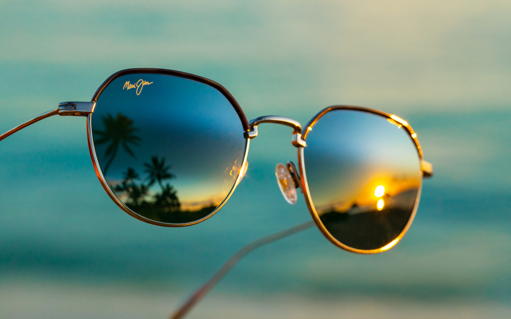 Island Eyes sunglasses against blue sky background