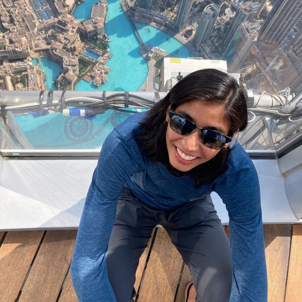 A woman showing a birds eye view of the city