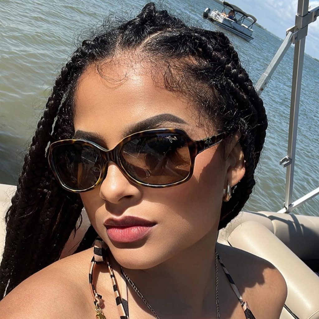 A woman boating at the sea