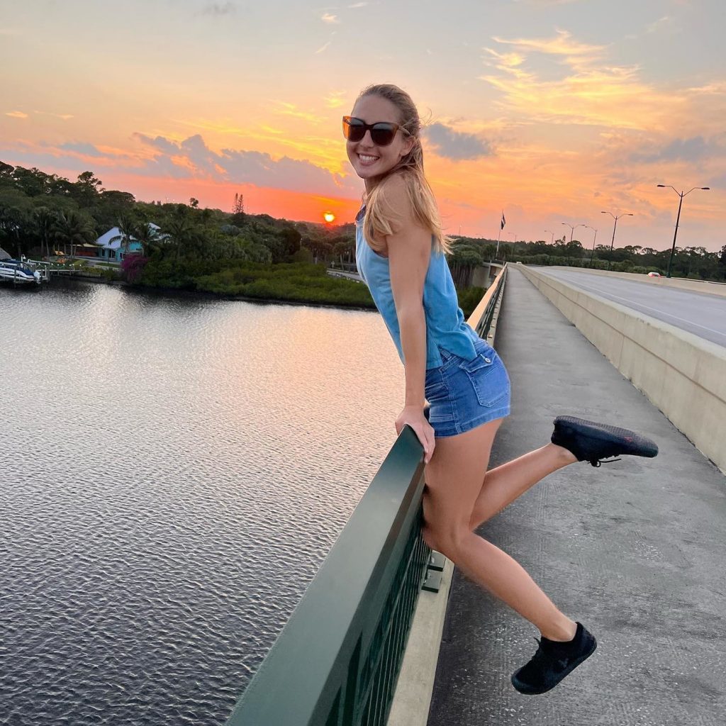 A woman holding on to a rail