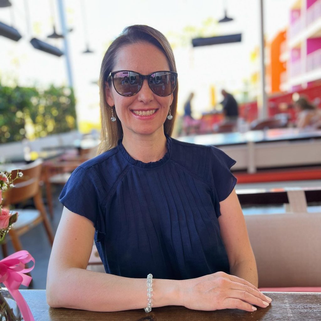 A woman seated at a table