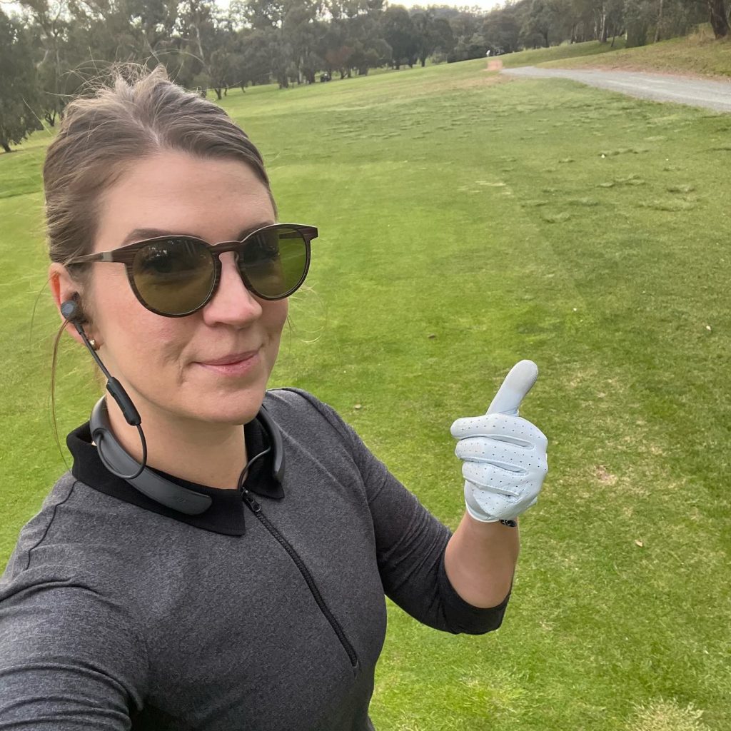 A woman on a golf course