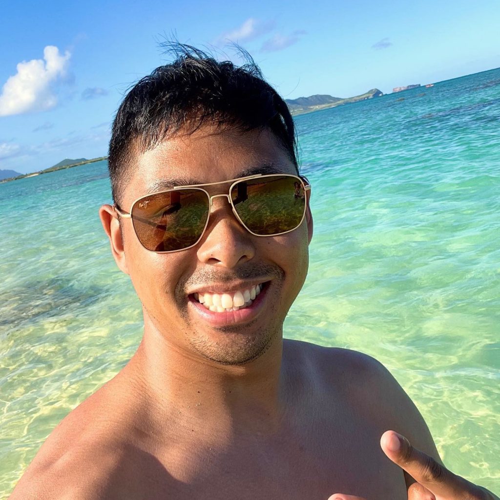 A man swimming at the beach